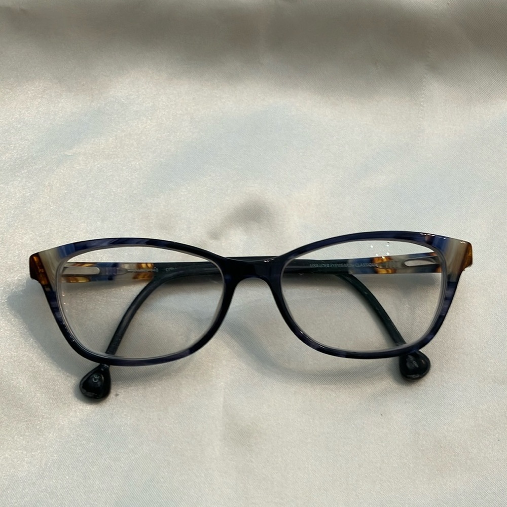 Glass frames with prescription potions lenses.  In excellent condition.